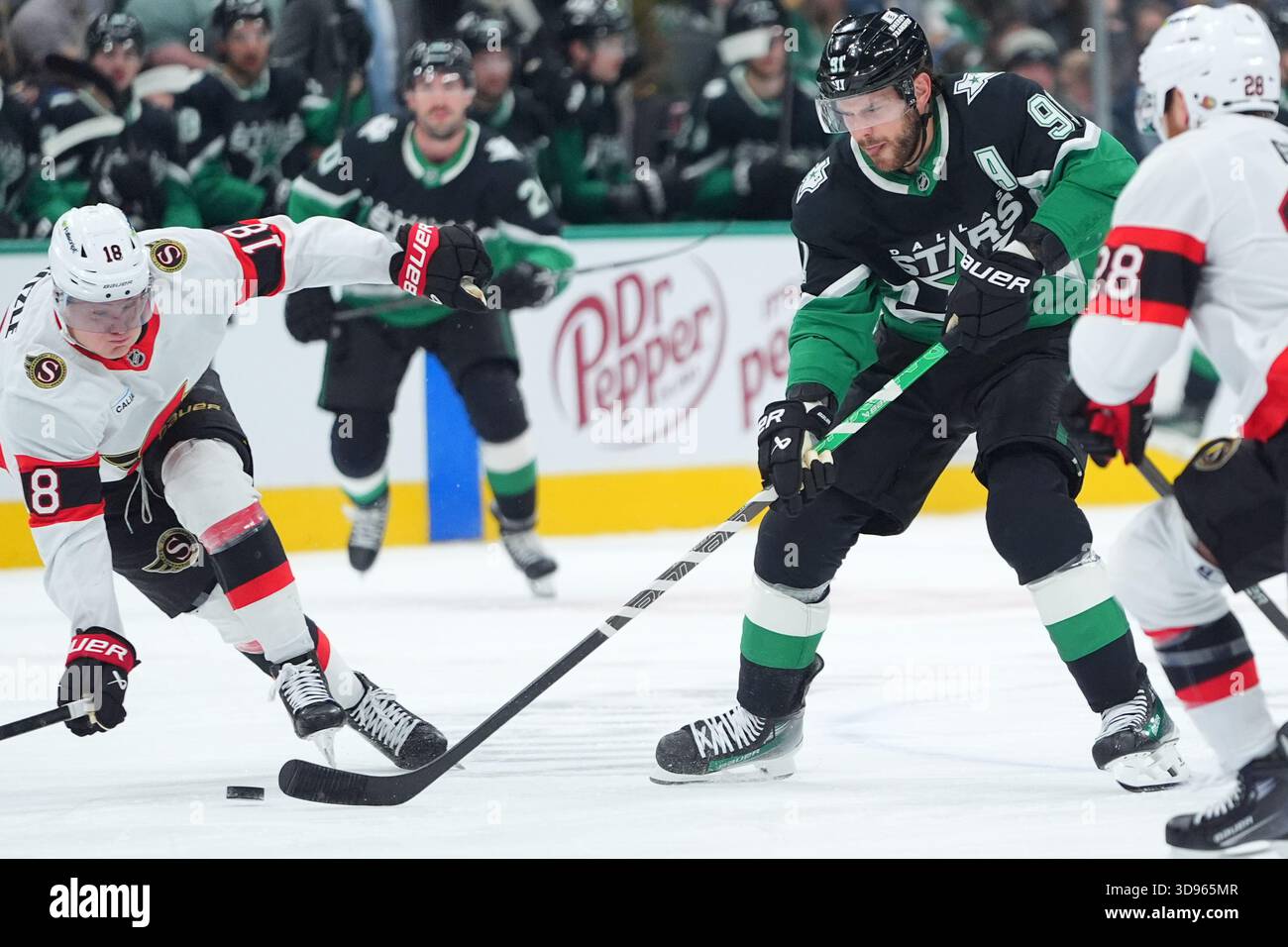 Dallas Stars center Tyler Seguin skates for the puck against Ottawa ...