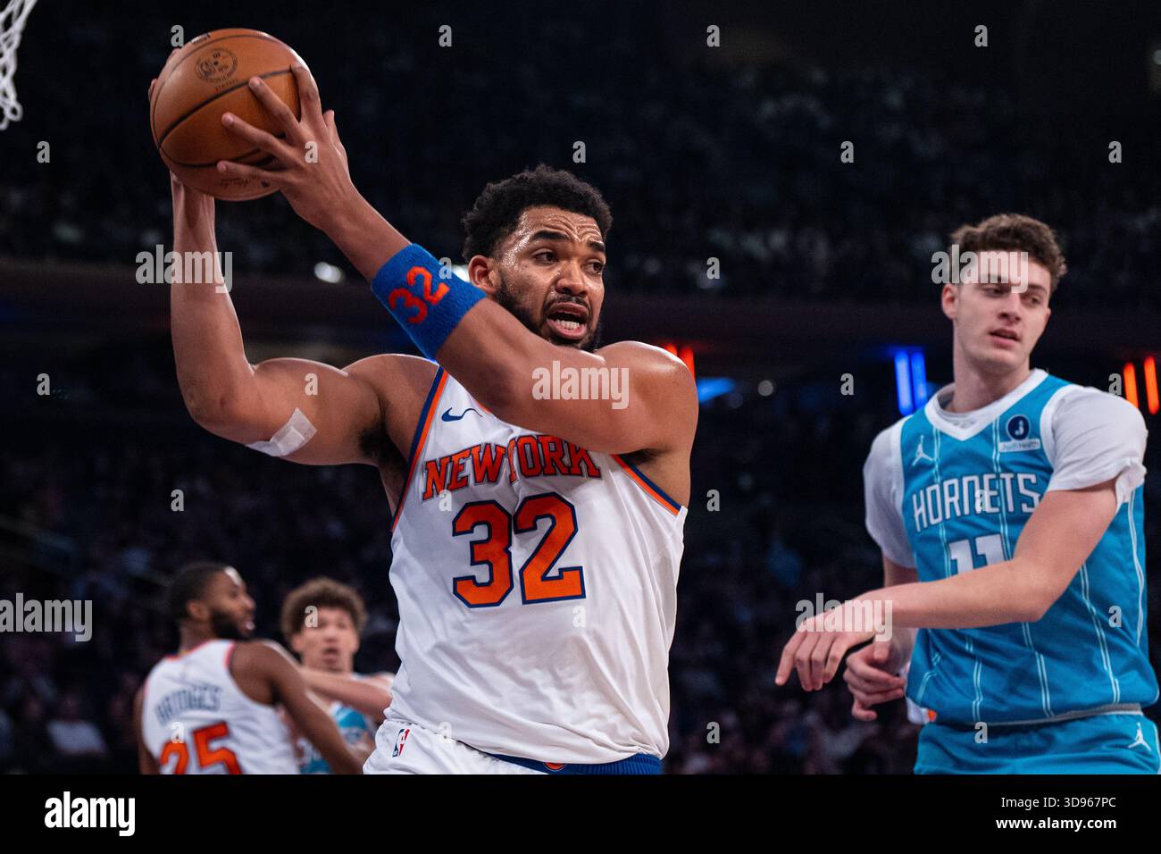 New York Knicks center Karl-Anthony Towns (32) catches a rebound during ...