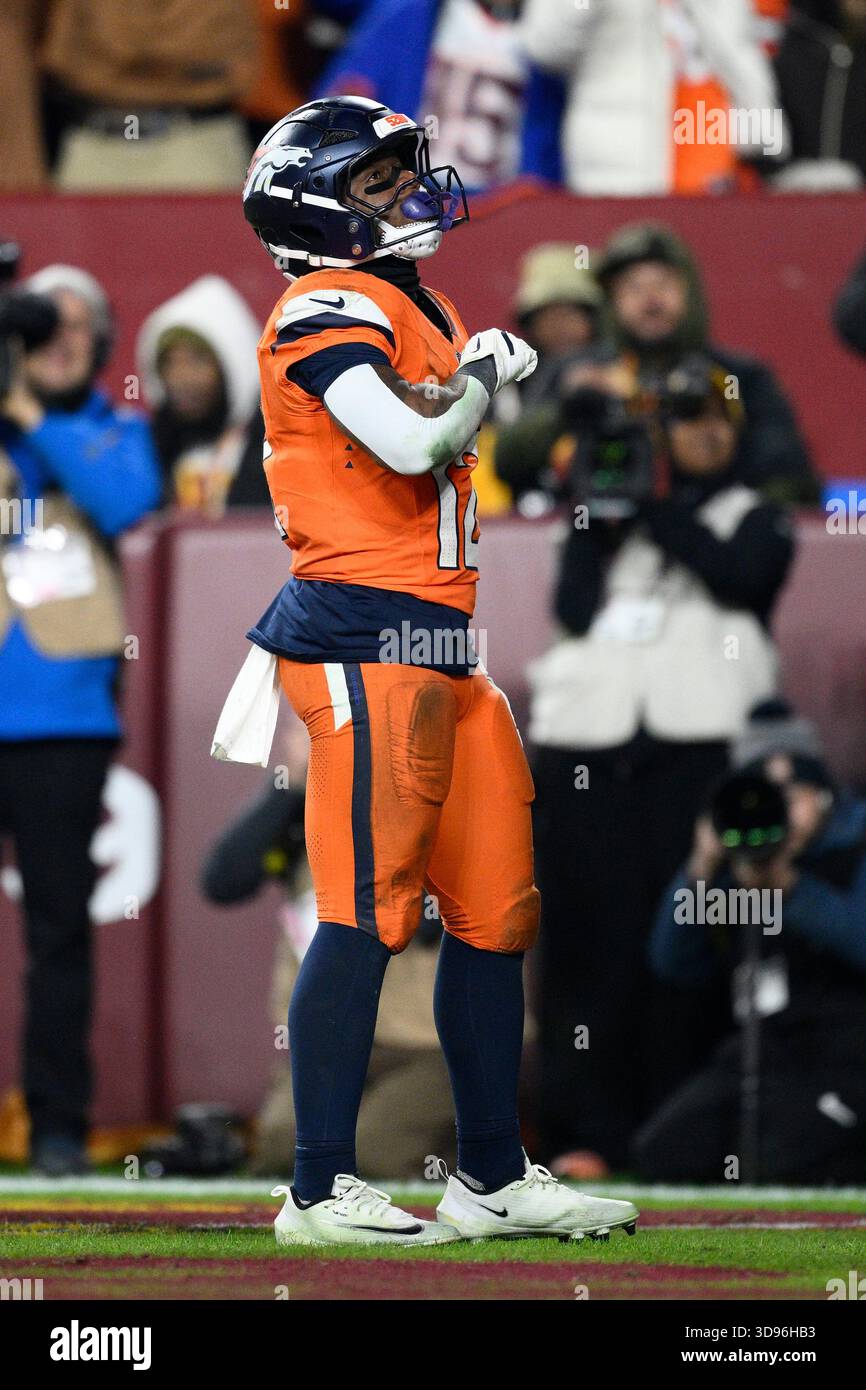 Denver Broncos running back RJ Harvey (12) celebrates his touchdown