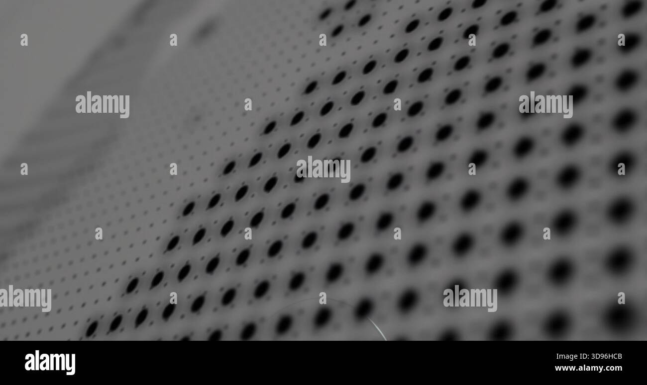 Showing perforated panel displaying diagonal holes at workbench, revealing matte finish scratches Stock Photo