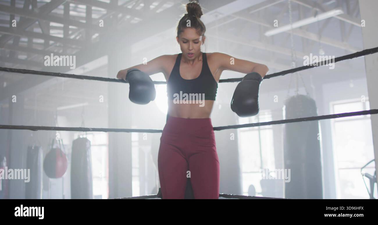 Tired female boxer resting arms hi-res stock photography and images - Alamy