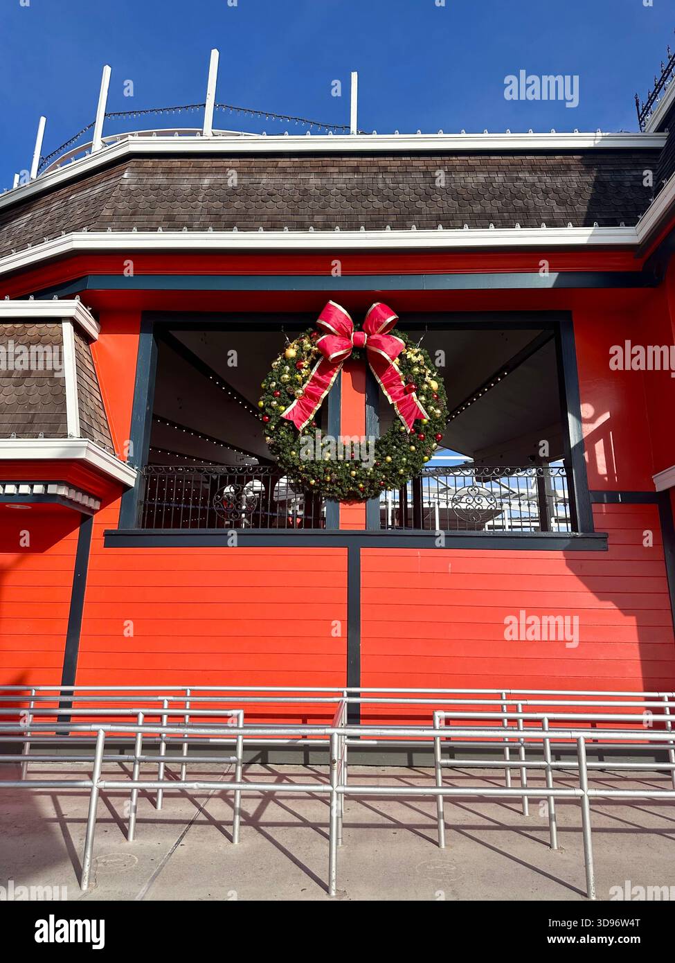 Christmas Wreath on Red Building at Santa Cruz Boardwalk - Smartphone Captured Stock Image