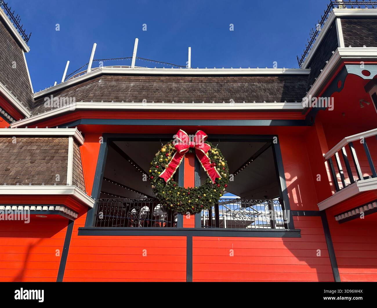 Christmas Wreath on Red Building at Santa Cruz Boardwalk - Smartphone Captured Stock Image