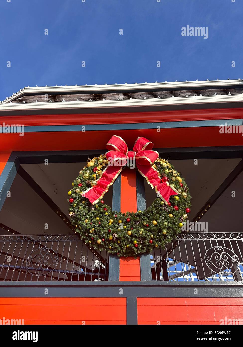 Christmas Wreath on Red Building at Santa Cruz Boardwalk - Smartphone Captured Stock Image