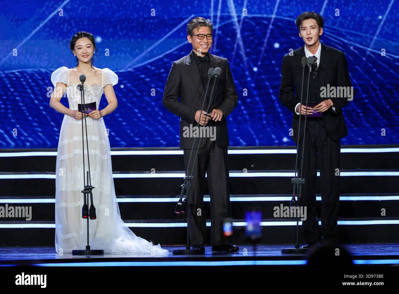 Actress Wu Qian (L), actors Li Naiwen and Bi Wenjun introduce the ...