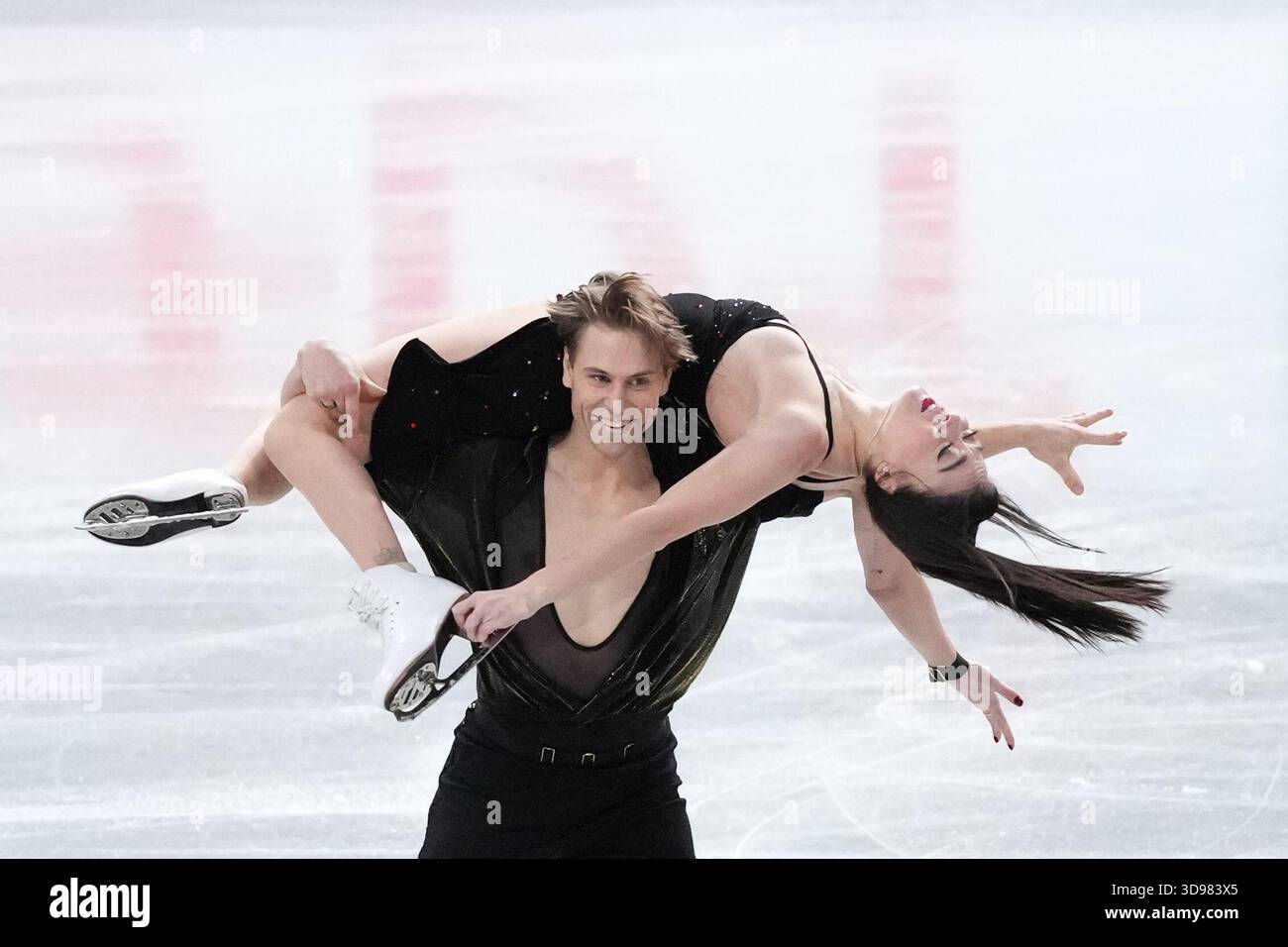 Allison Reed and Saulius Ambrulevicius, of Lithuania, compete in the ...
