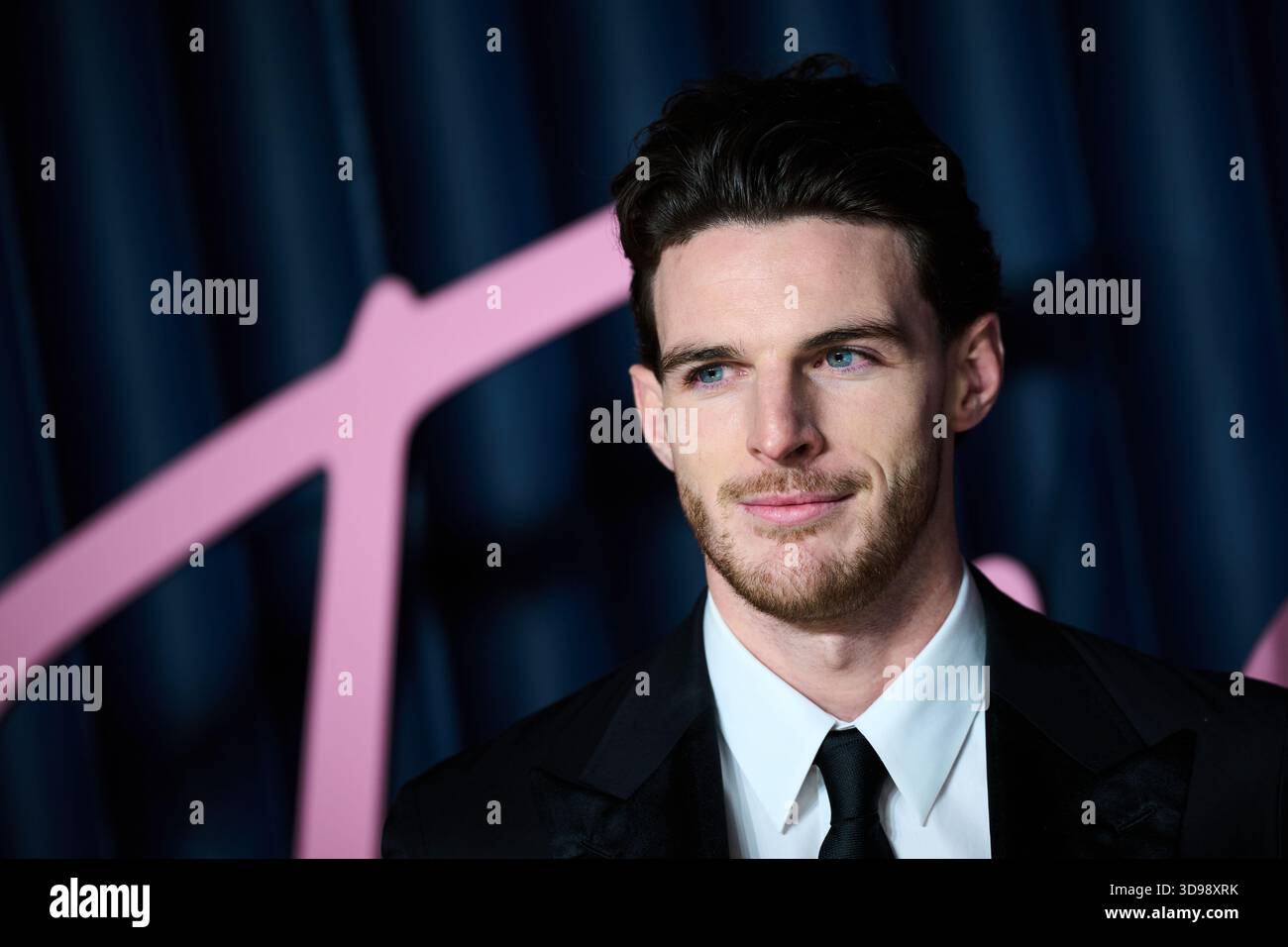 Declan Rice poses for photographers upon arrival at 'The Fashion Awards ...