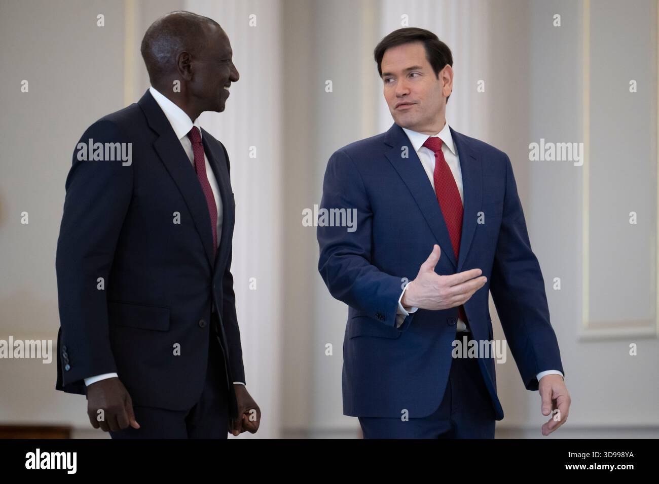 Secretary of State Marco Rubio walks with Kenyan President William Ruto ...