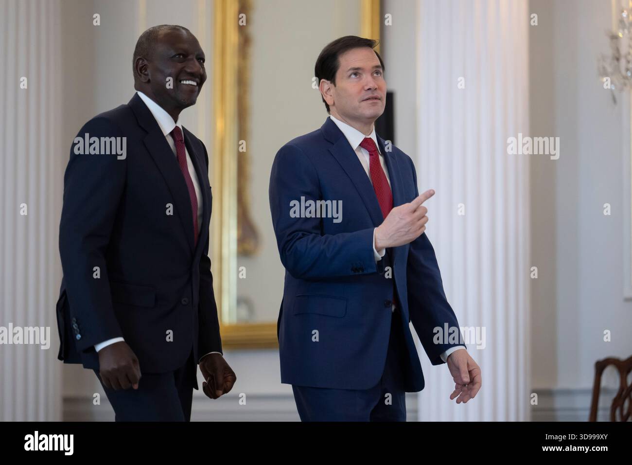 Secretary of State Marco Rubio walks with Kenyan President William Ruto ...