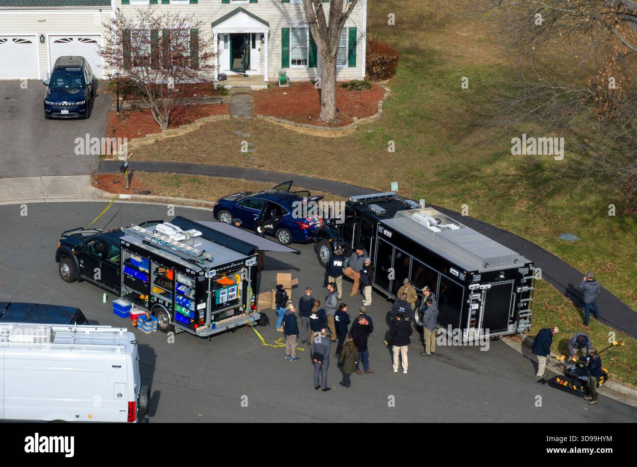 Prince William County Police block the street near the house where the ...