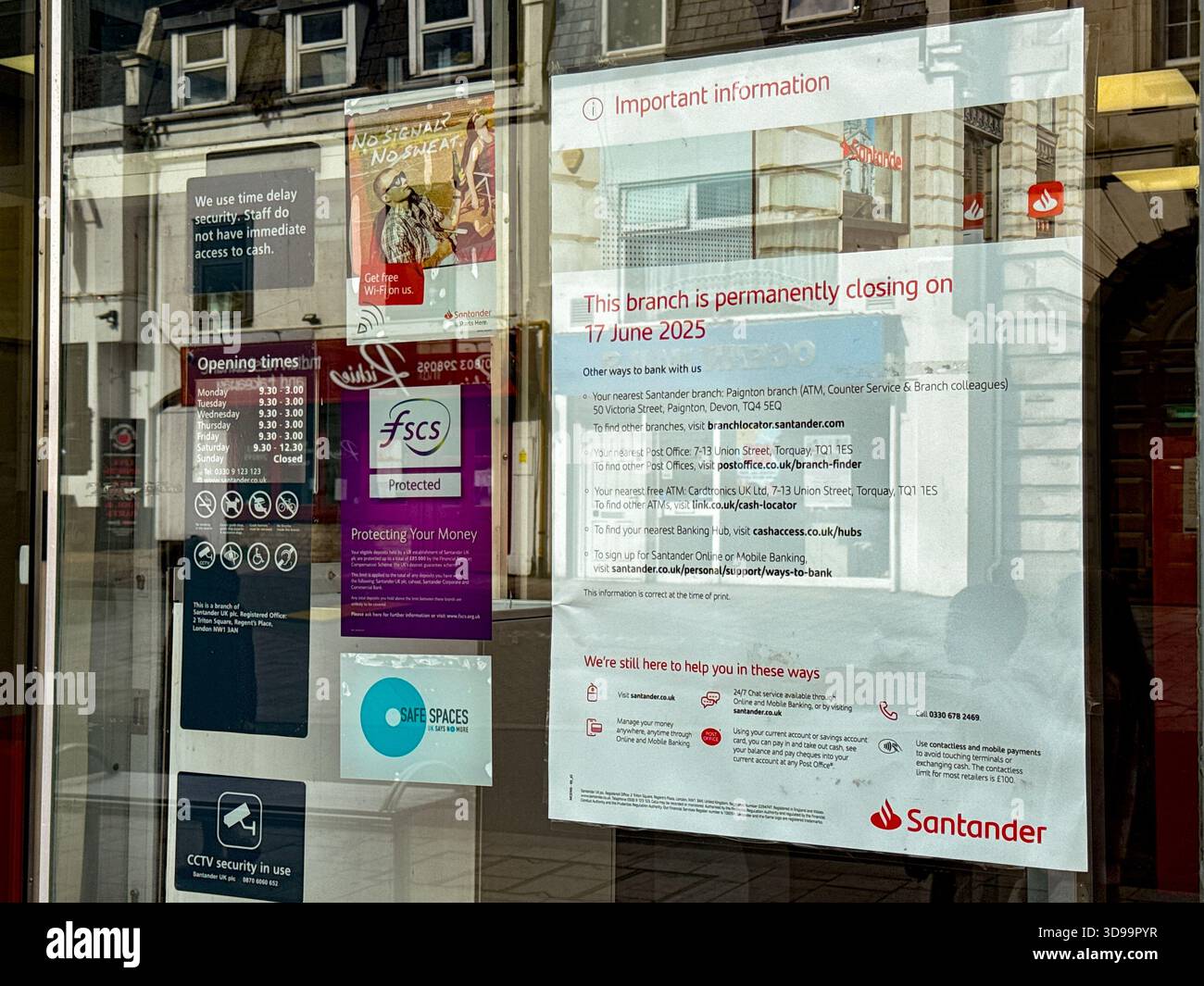 Torquay, Devon, England, Uk - 23 April 2025: Sign with important information in the window of the town's branch of Santander which has closed down - Smartphone Captured Stock Image