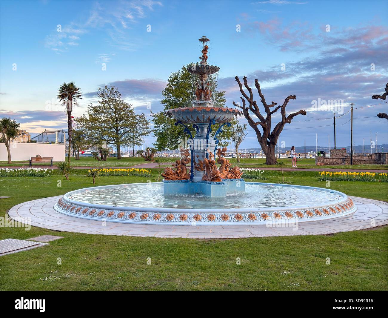 Torquay, Devon, England, Uk - 23 April 2025: Ornate fountain in the public gardens on the seafront of Torquay in evening light. - Smartphone Captured Stock Image