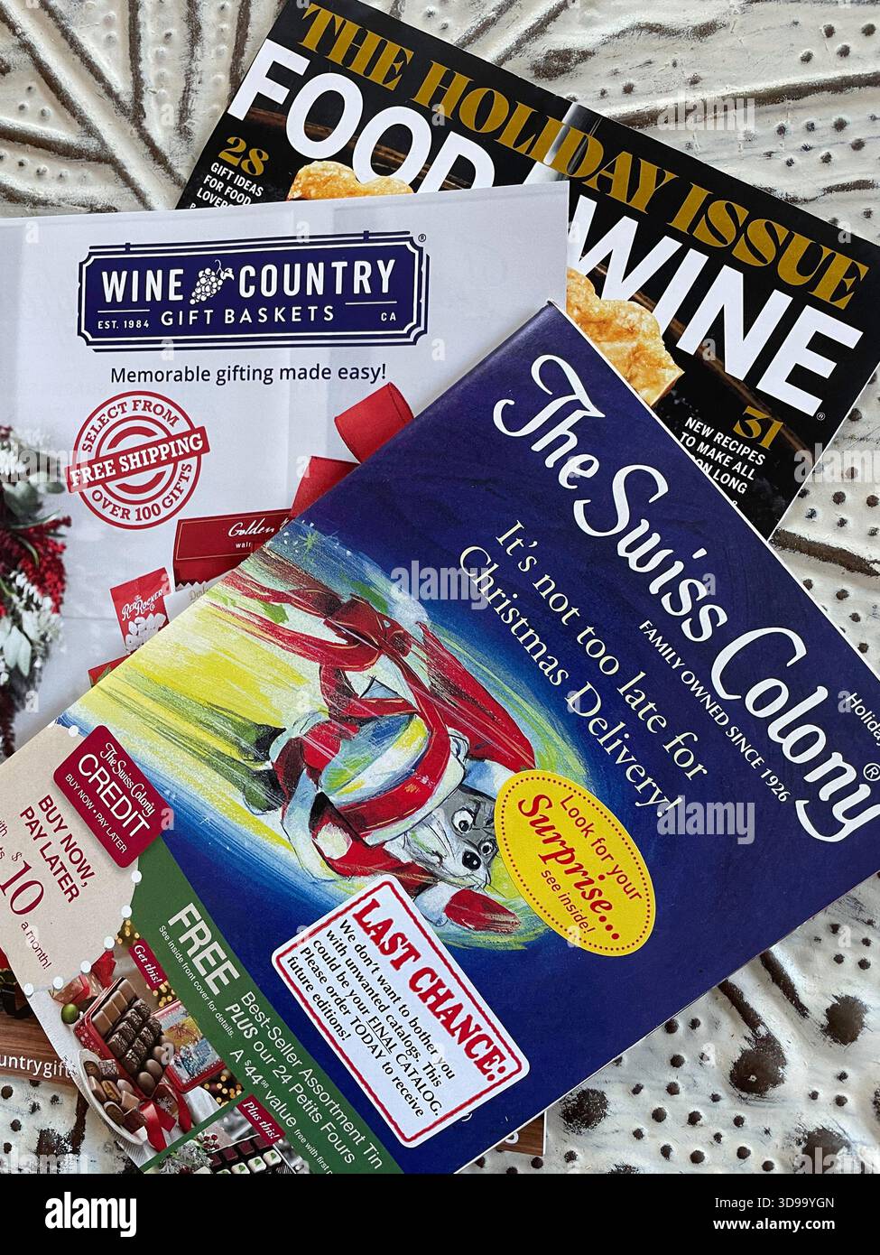 Close up of a group of holiday mail order catalogs and Food and Wine Magazine, 2025, United States - Smartphone Captured Stock Image