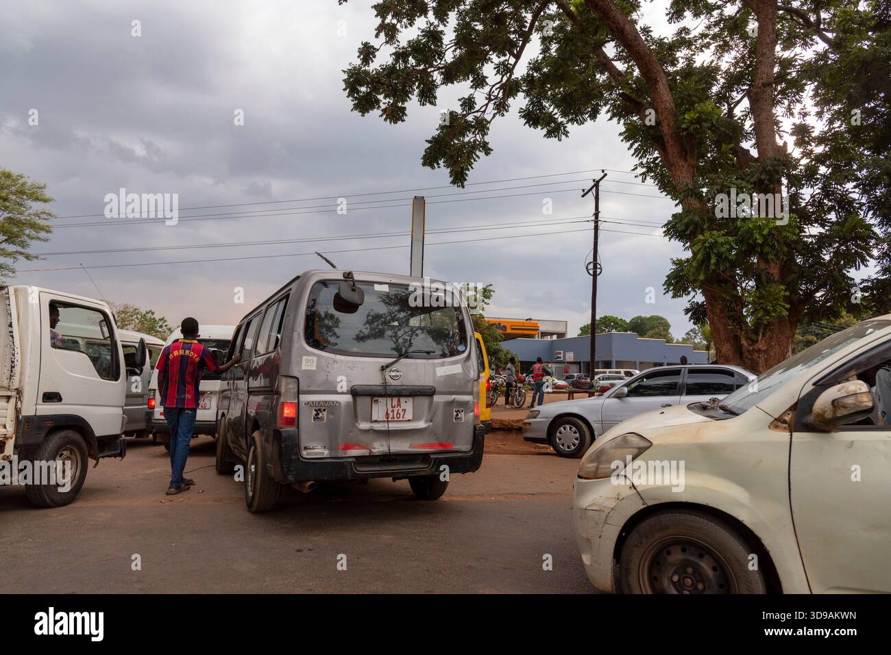 Lilongwe Malawi Africa. 08.11.2025. Vehicles queue to buy fuel at a petrol station in Lilongwe southern Malawi Africa - Stock Image