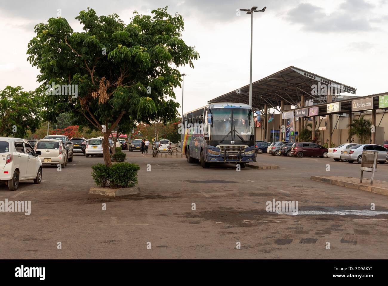 Lilongwe Malawi Africa. 08.11.2025. Malawian national bus parked up at a shopping mall in Lilongwe. National bus travels throughot the country. - Stock Image