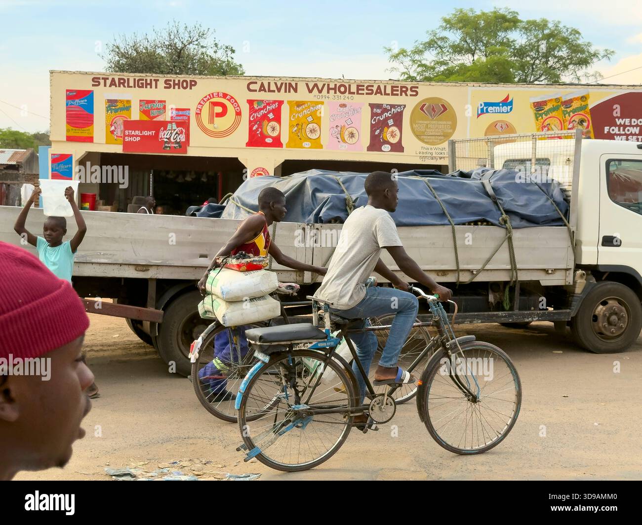 Lilwonde southern Malawi Africa. 17.11.2025. Taxi bikes one empty the other carrying cement bags in the town of Lilwonde southern Malawi. - Stock Image