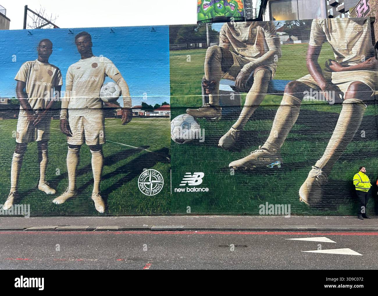 Footballer Bukayo Saka and rapper Dave advertising New Balance and Stone Island collaboration football boots and kits - Smartphone Captured Stock Image