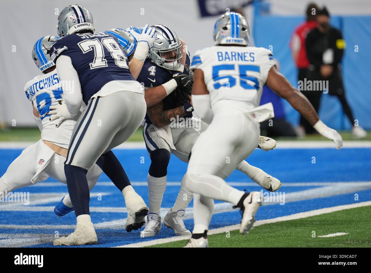 Dallas Cowboys quarterback Dak Prescott (4) is sacked by Detroit Lions ...