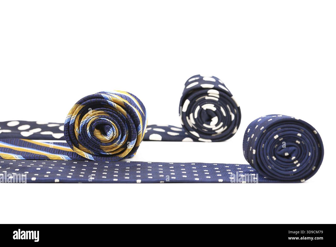 Bright rolled ties isolated on a white background Stock Photo