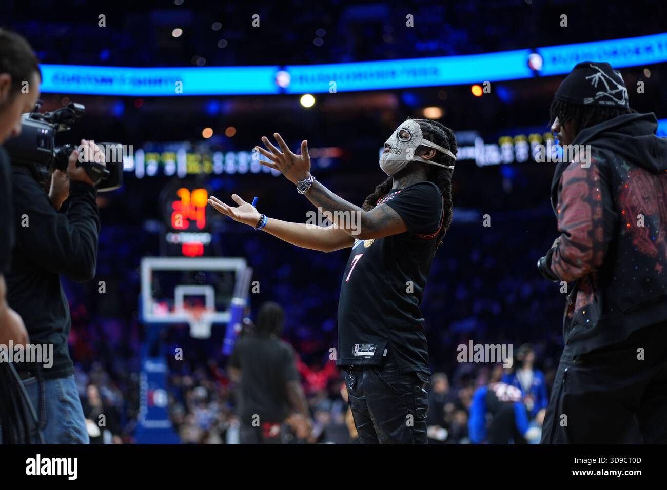 Rapper Skrilla reacts during an NBA basketball game Thursday, Dec. 4 ...