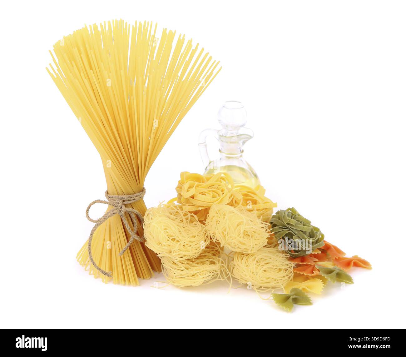Different pasta and olive oil. White background Stock Photo