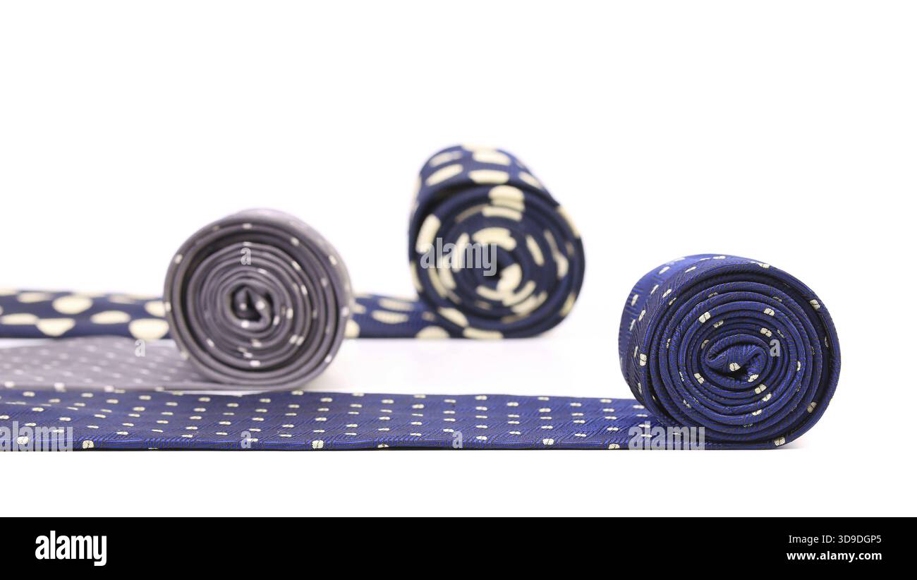 Bright rolled ties isolated on white background Stock Photo