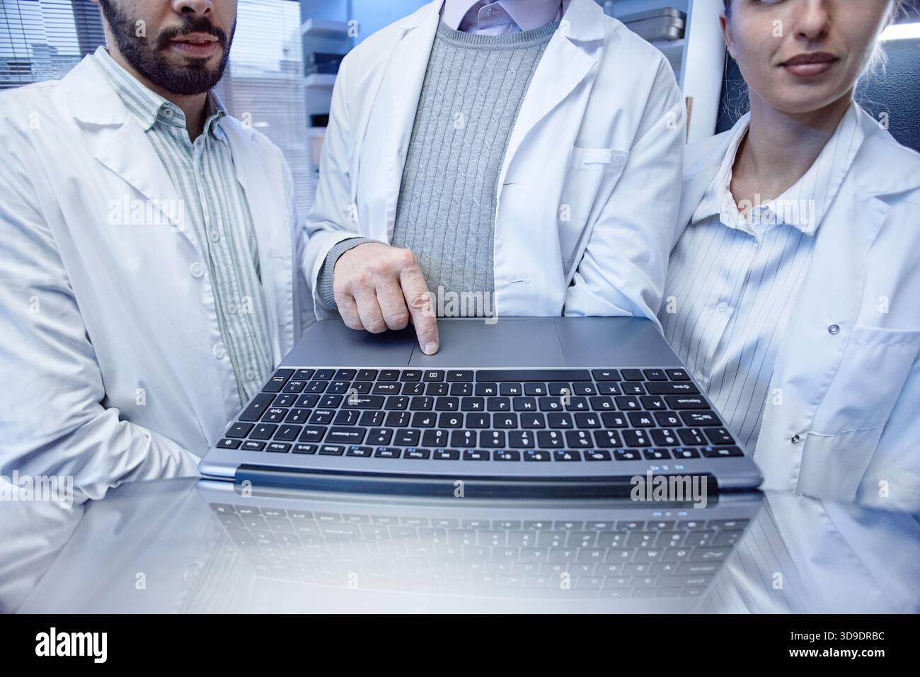 Doctor demonstrating work device hi-res stock photography and images ...