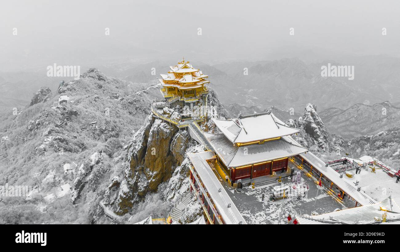 Aerial daytime winter view of the twin golden Taoist temples on the ...