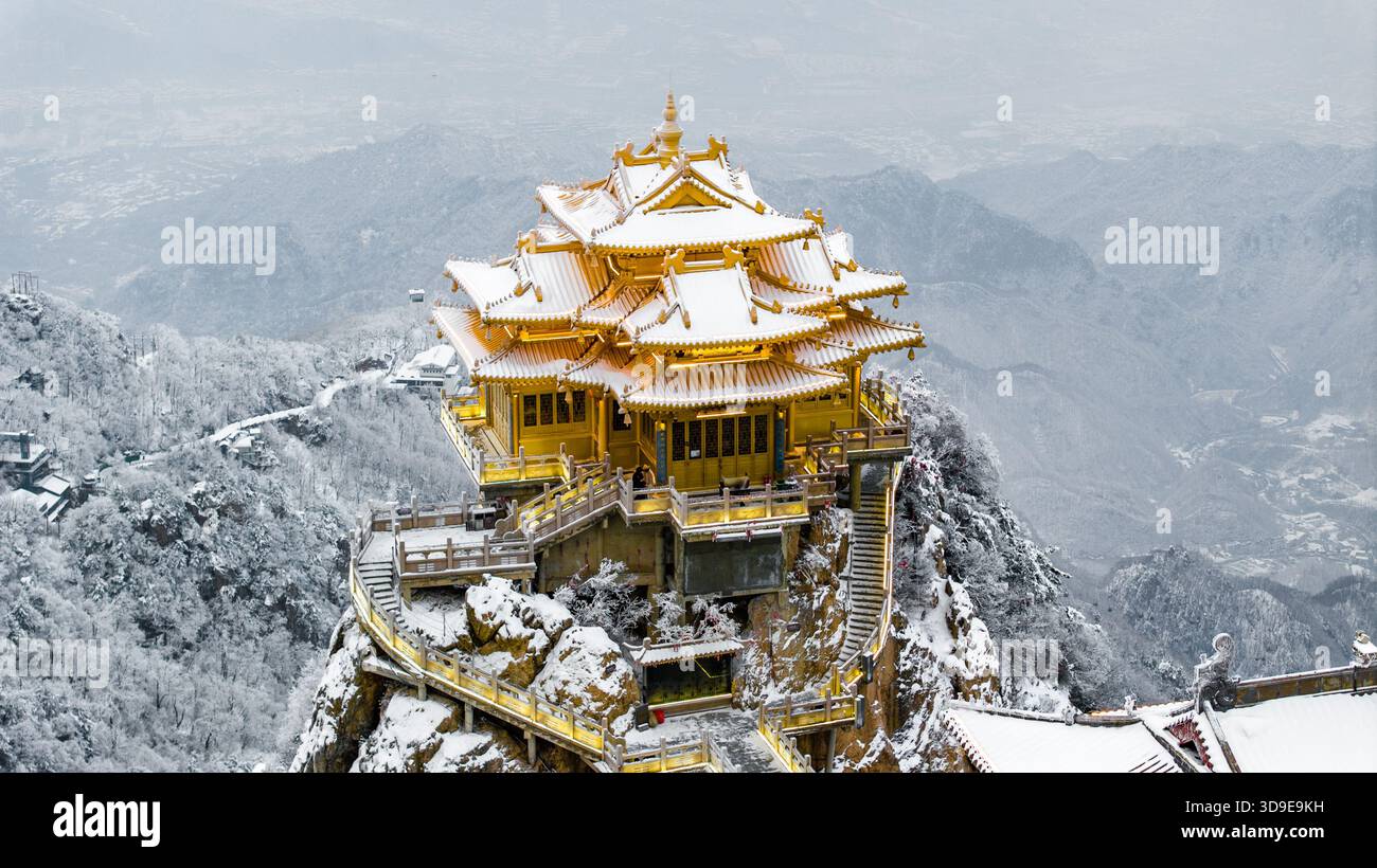 Aerial daytime winter view of the twin golden Taoist temples on the ...