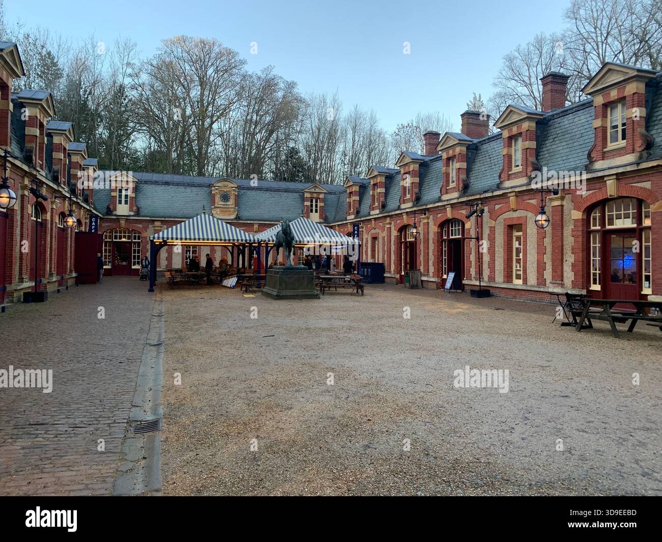 Neo-Renaissance French Chateau- inspired Waddeston Manor house Ornate facade Turrets and domes Steep slate roof decorative stone work Symmetrical - Smartphone Captured Stock Image
