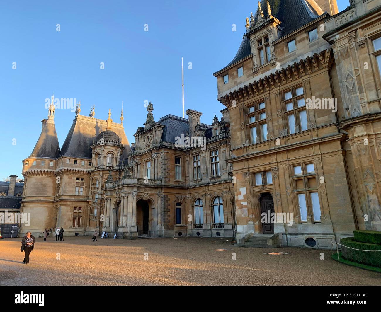 Neo-Renaissance French Chateau- inspired Waddeston Manor house Ornate facade Turrets and domes Steep slate roof decorative stone work Symmetrical - Smartphone Captured Stock Image