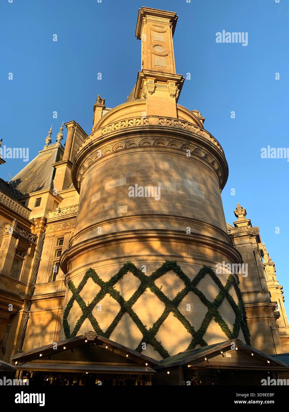 Neo-Renaissance French Chateau- inspired Waddeston Manor house Ornate facade Turrets and domes Steep slate roof decorative stone work Symmetrical - Smartphone Captured Stock Image