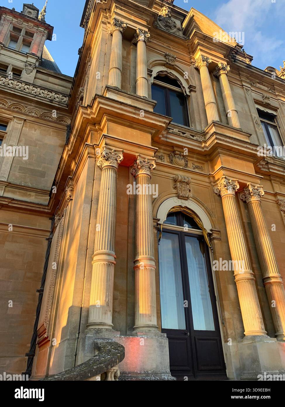 Neo-Renaissance French Chateau- inspired Waddeston Manor house Ornate facade Turrets and domes Steep slate roof decorative stone work Symmetrical - Smartphone Captured Stock Image