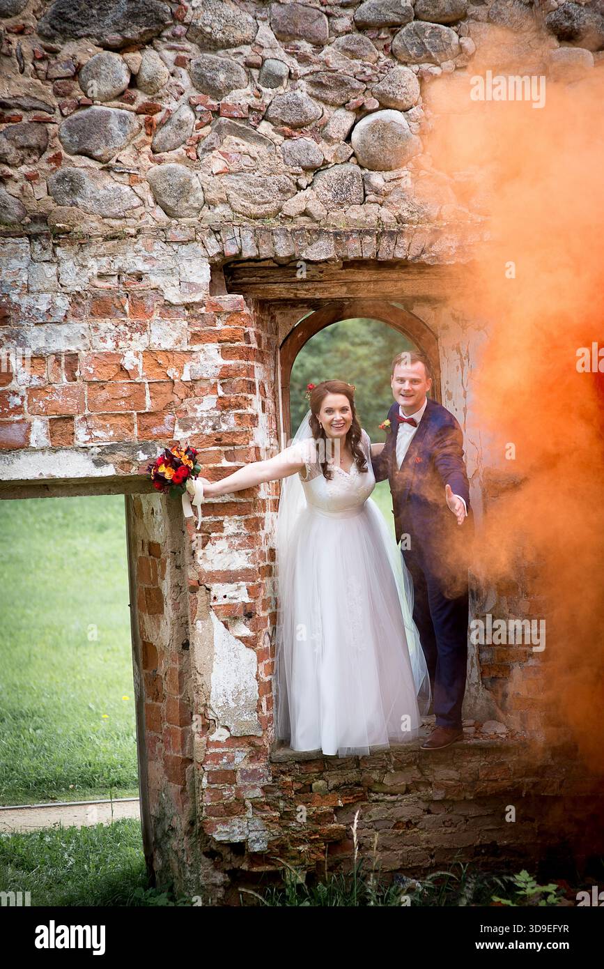Orange and green dress hi-res stock photography and images - Alamy