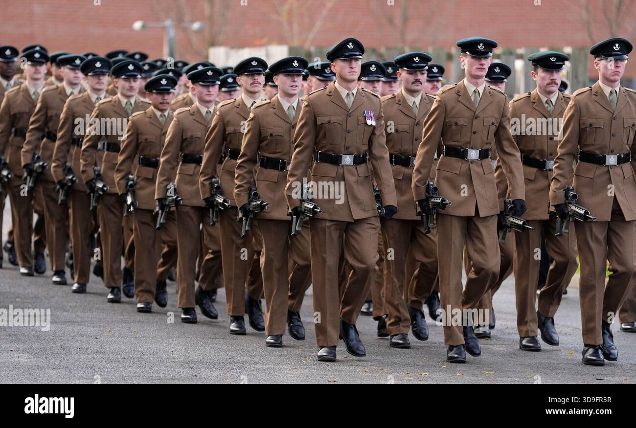 Members of 5 Rifles march on to the parade ground during a visit by the ...