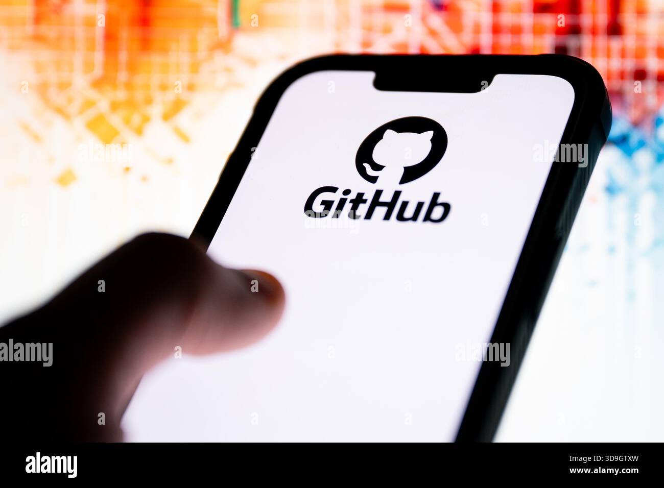 In this photo illustration, a GitHub logo seen displayed on a smartphone. Stock Photo