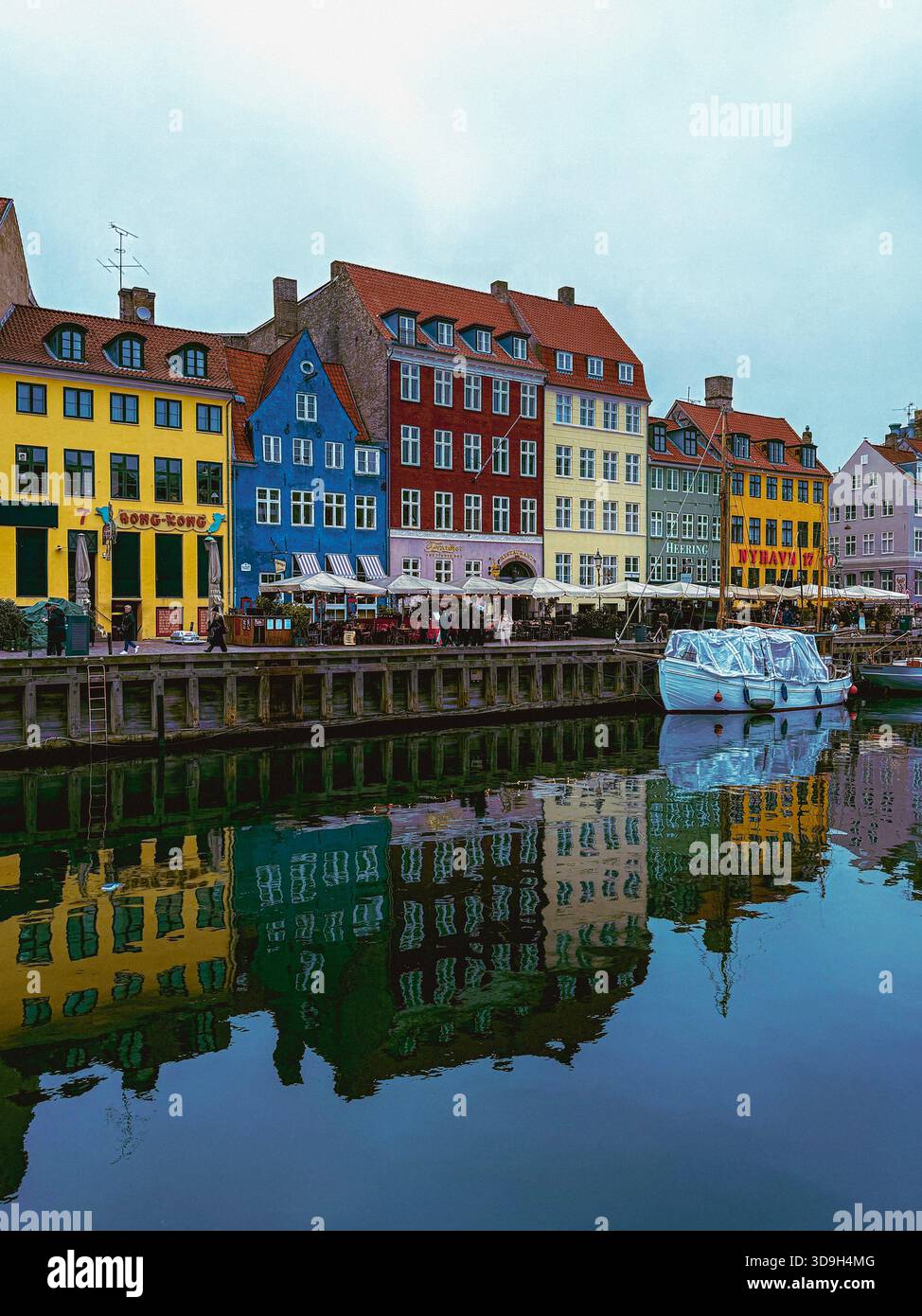Nyhavn Canal with Reflections and Boats in Copenhagen - Smartphone Captured Stock Image
