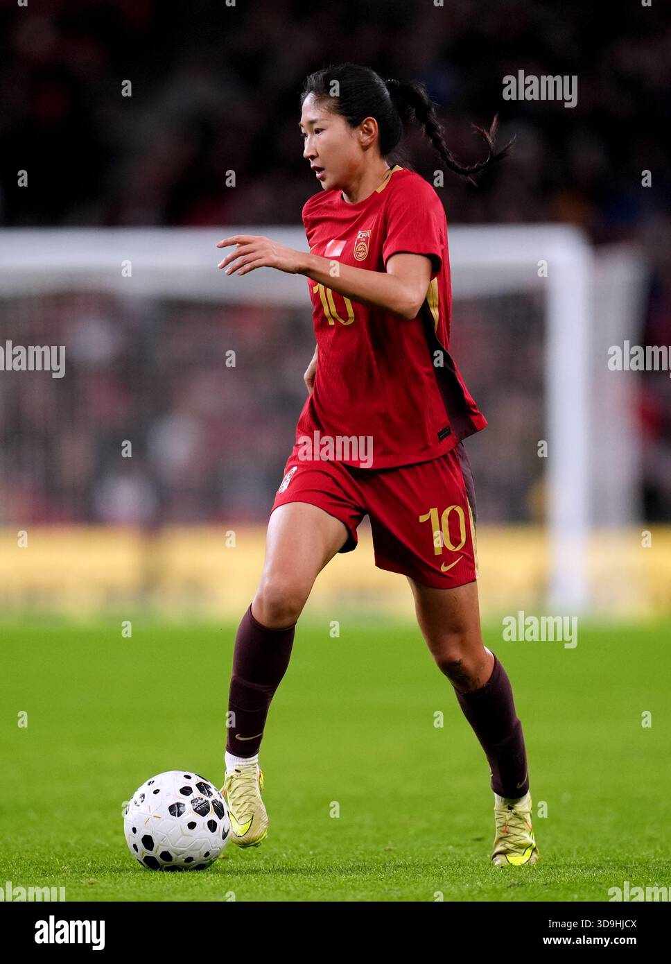 China’s Yanwen Wang during the women's international friendly match at ...