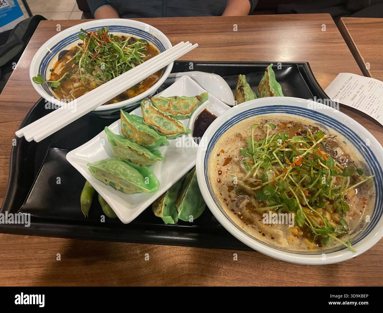 vegan Asian Meal, Straits food village restaurant in Changi Airport, Ramen, Gyozas, Changi Aiport, Singapore - Smartphone Captured Stock Image
