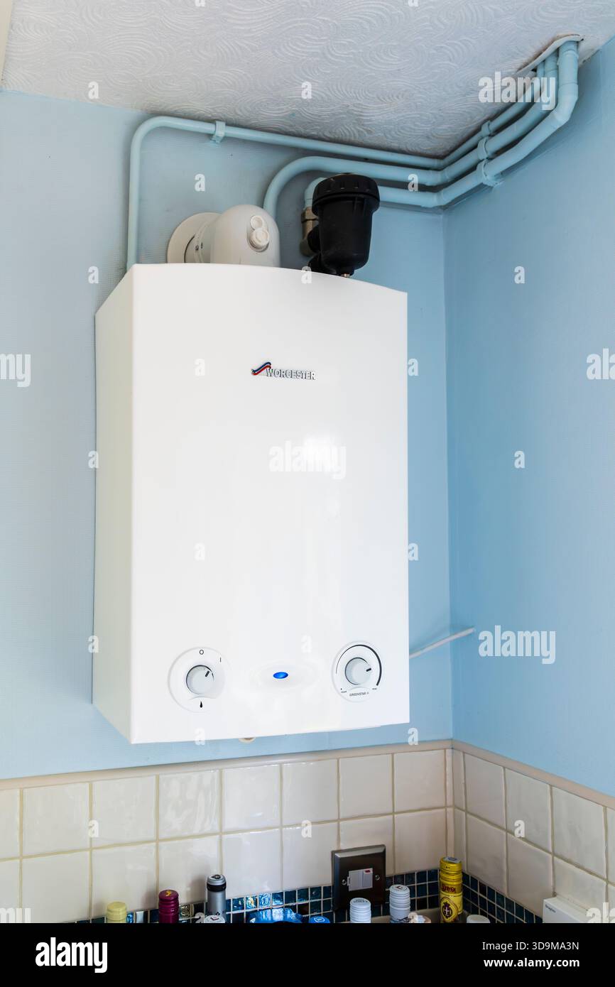 A wall mounted Worcester gas regular boiler - a compact boiler type for generating heating & hot water from a single unit, UK. Concept: heating bills Stock Photo