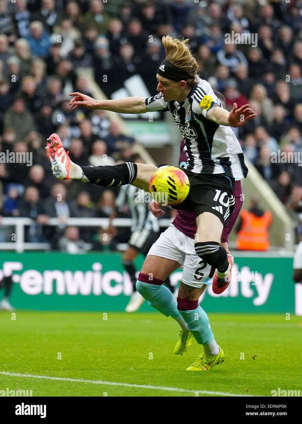 Newcastle United's Anthony Gordon (front) and Burnley's Kyle Walker ...