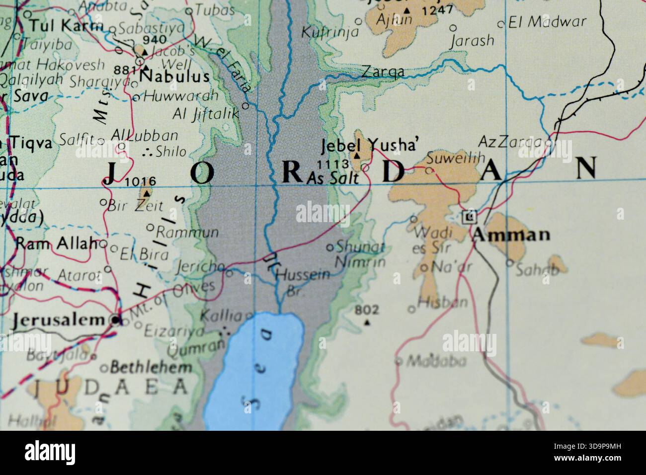 Detailed map close-up of Jordan and the Dead Sea region, highlighting Amman, Jerusalem, Jericho, and the Jordan River Valley. Stock Photo