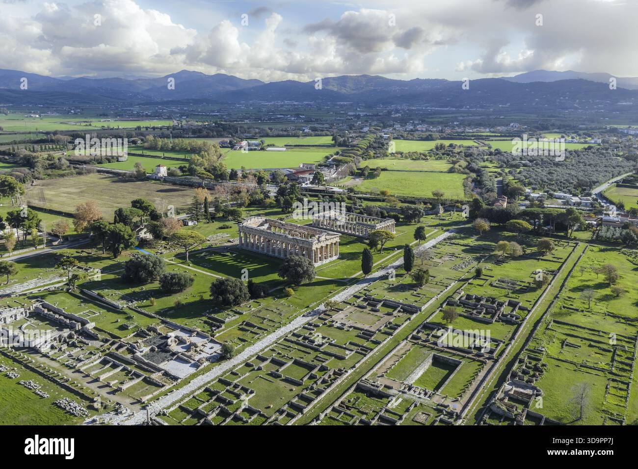 Aerial view of the ancient Greek temples amidst the sprawling ruins, a ...