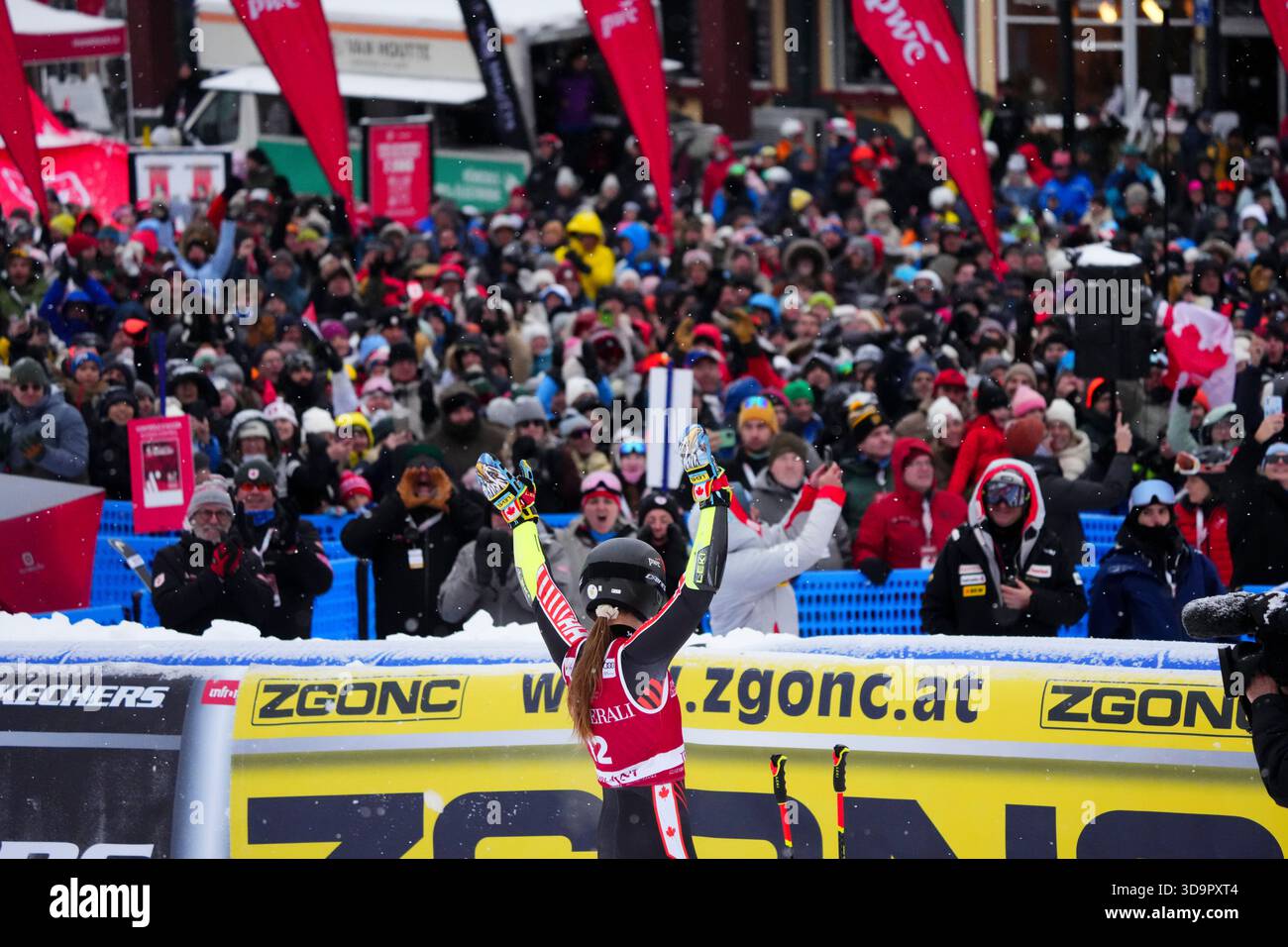 Valerie Grenier of Canada waves to the crowd following her second run ...