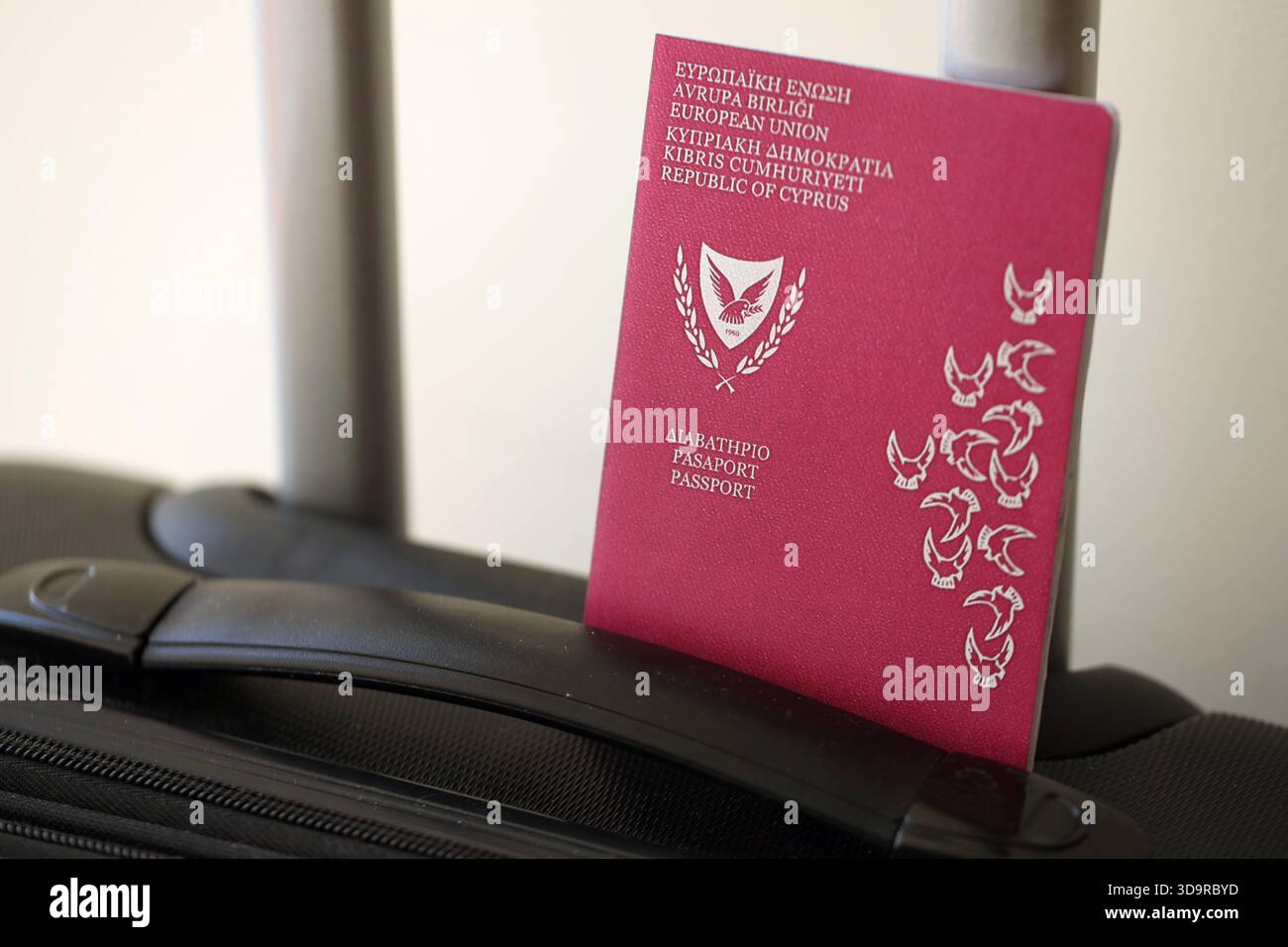 Kyprus passport on touristic baggage luggage in airport close up. Travel and tourism in Europe concept Stock Photo