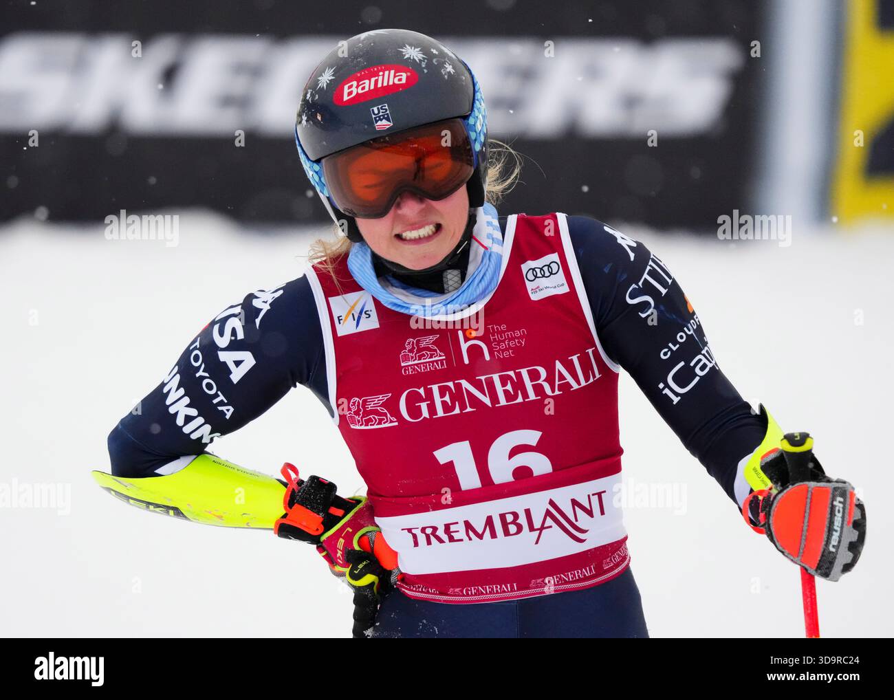 Mikaela Shiffrin of the USA reacts as she holds her side following her ...