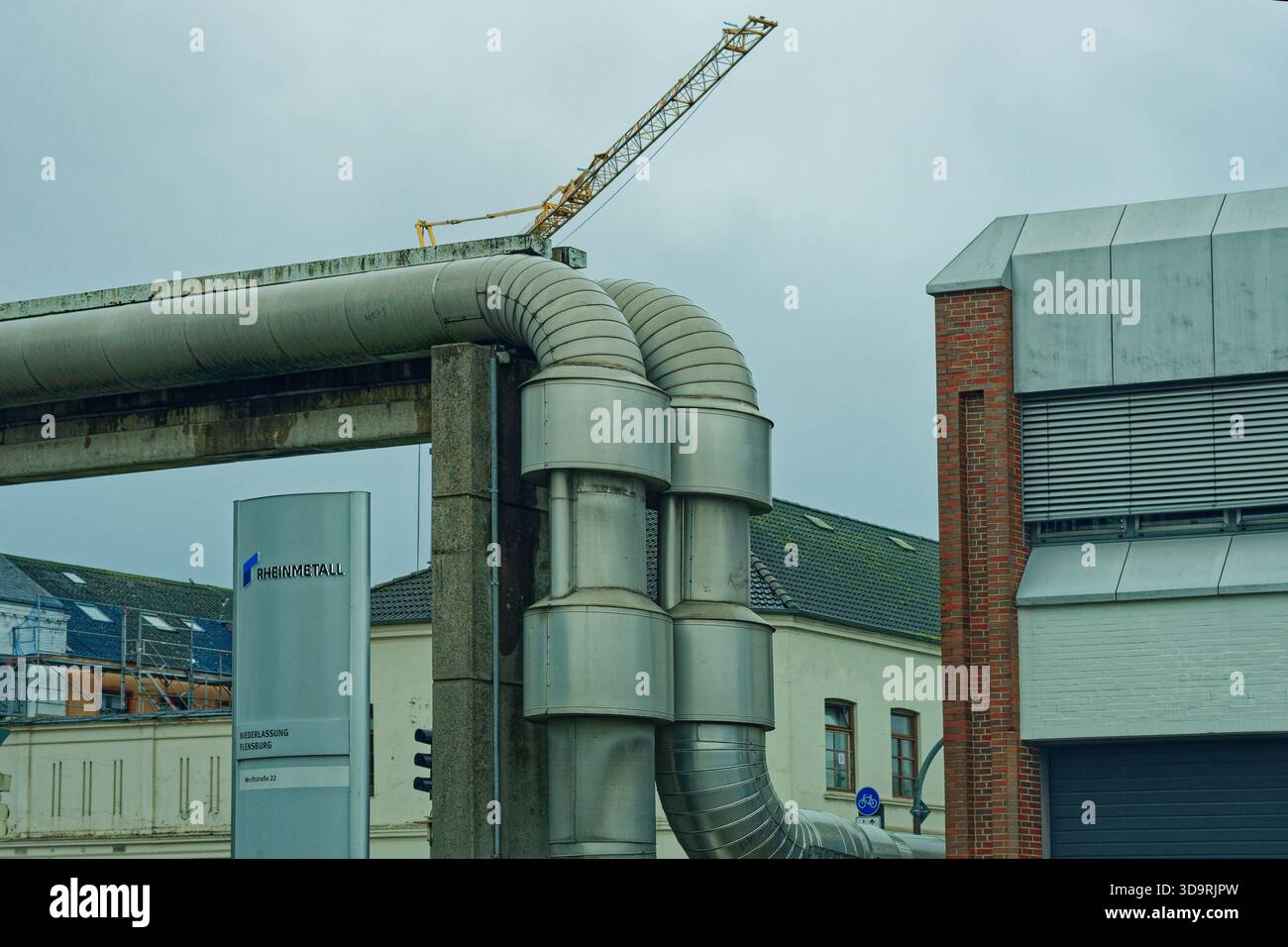 A visible sign marks a Rheinmetall facility, known for manufacturing ...