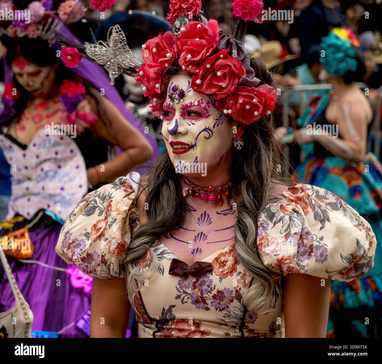 Woman in Day of the Dead costume and face paint parades in Mexico City, Mexico Stock Photo