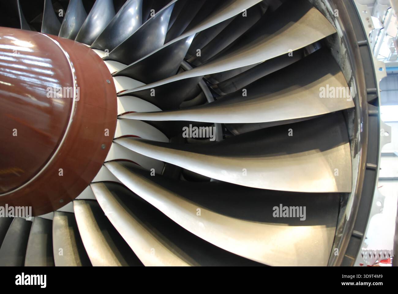 Close up view of a jet engine turbine, showcasing the intricate blades ...