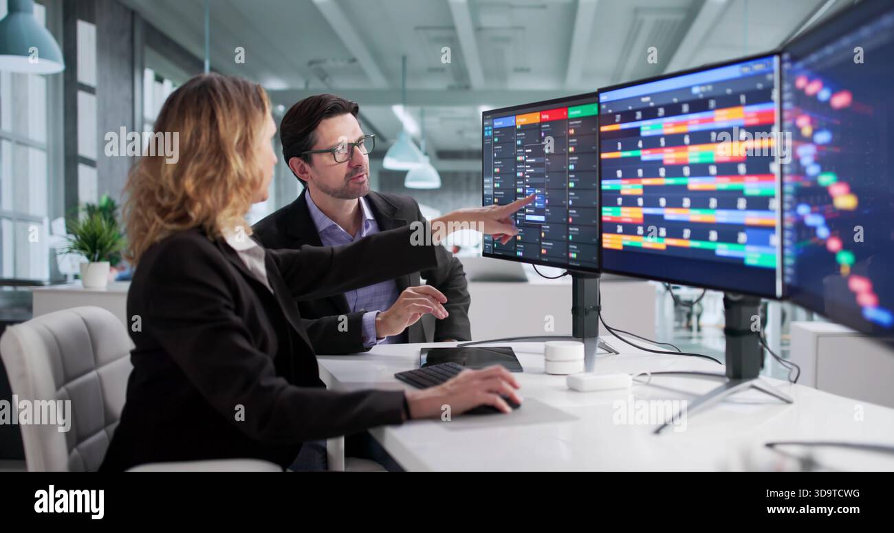 Busy Software Developer Creates Schedule Using Agile Calendar And Kanban. Stock Photo